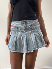 Vintage edit: festival | pequeña mini falda plisada de lavado de luz denim azul
