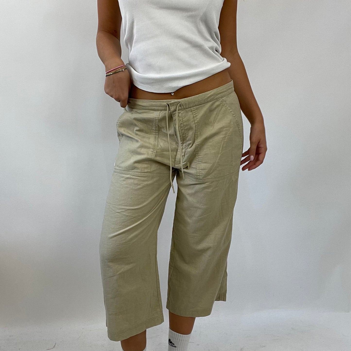 HAILEY BIEBER DROP | medium beige nike linen cropped trousers