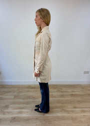 small beige trench coat