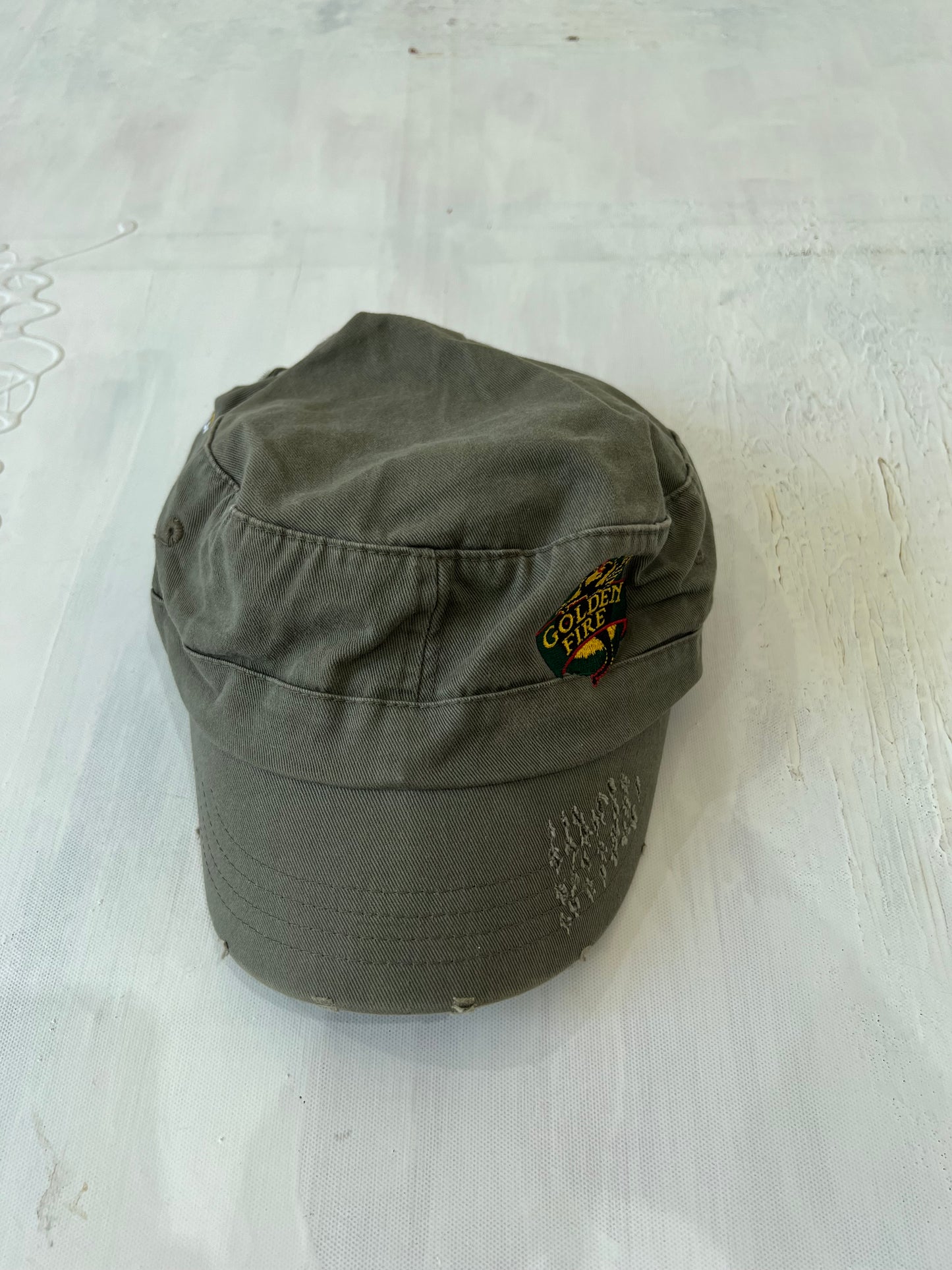 aquamarine drop | one size khaki golden fire cap