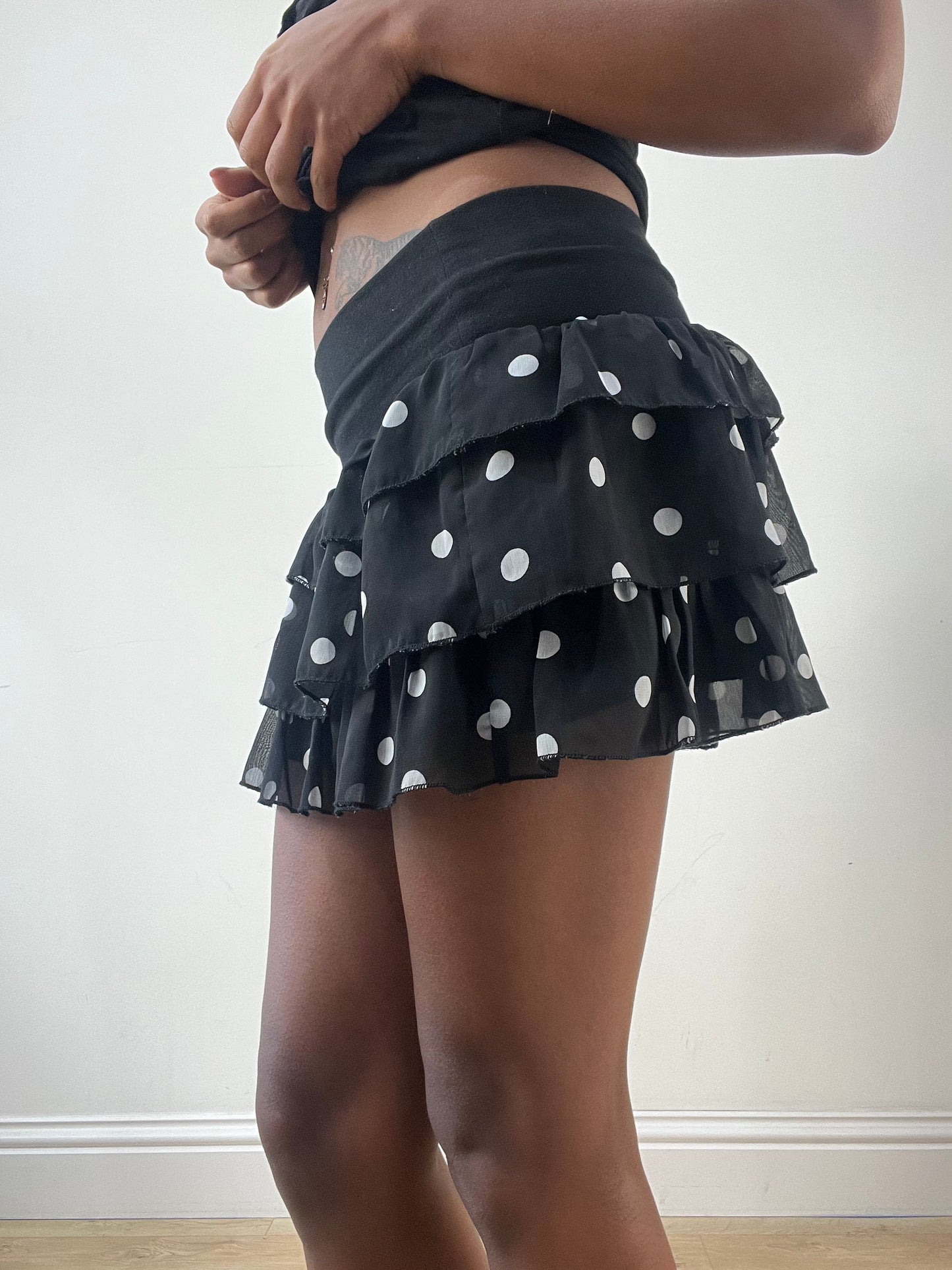 LFW edit | extra small black tiered mini skirt with white polka dot pattern