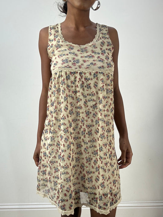 LFW edit | small beige mesh overlay midi dress with floral print