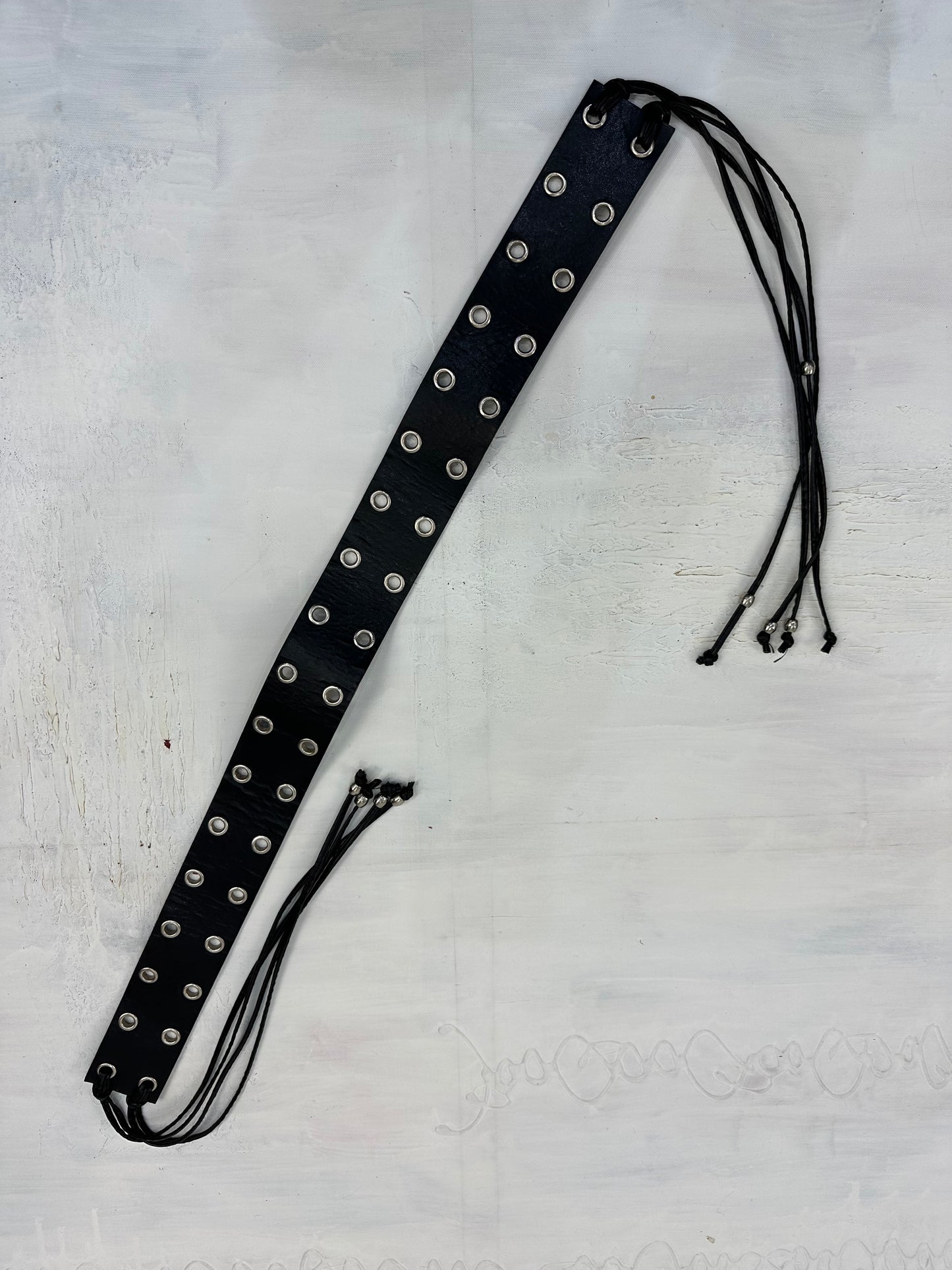 vintage edit: indie sleaze | black faux leather belt with silver eyelet details