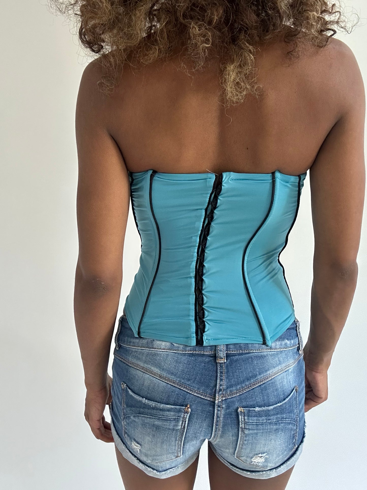 euro trash | medium blue and black contrast seam corset top