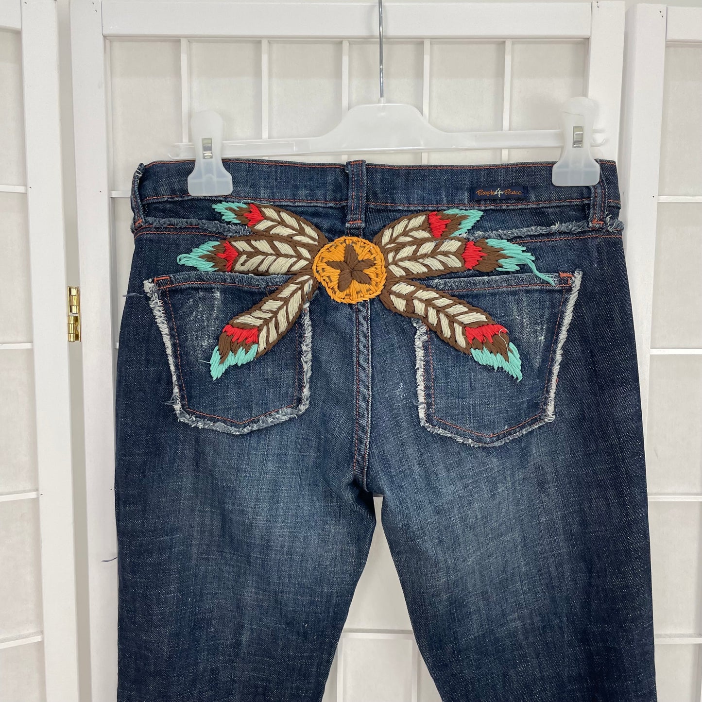 INSTA BADDIE DROP | XS dark blue embroidered jeans with lace up detail