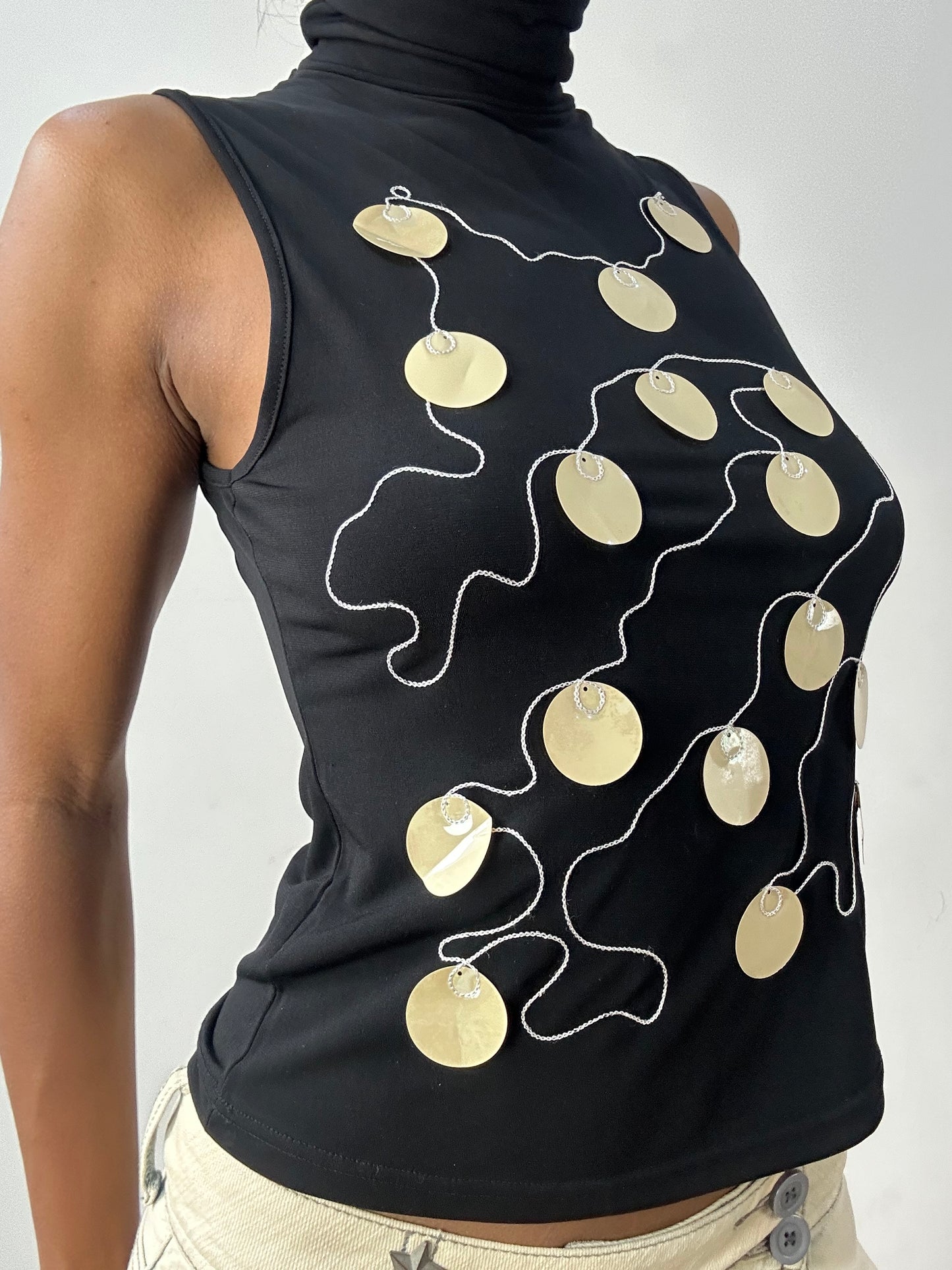 midsummer edit | small black sleeveless turtleneck with oversized sequin detail