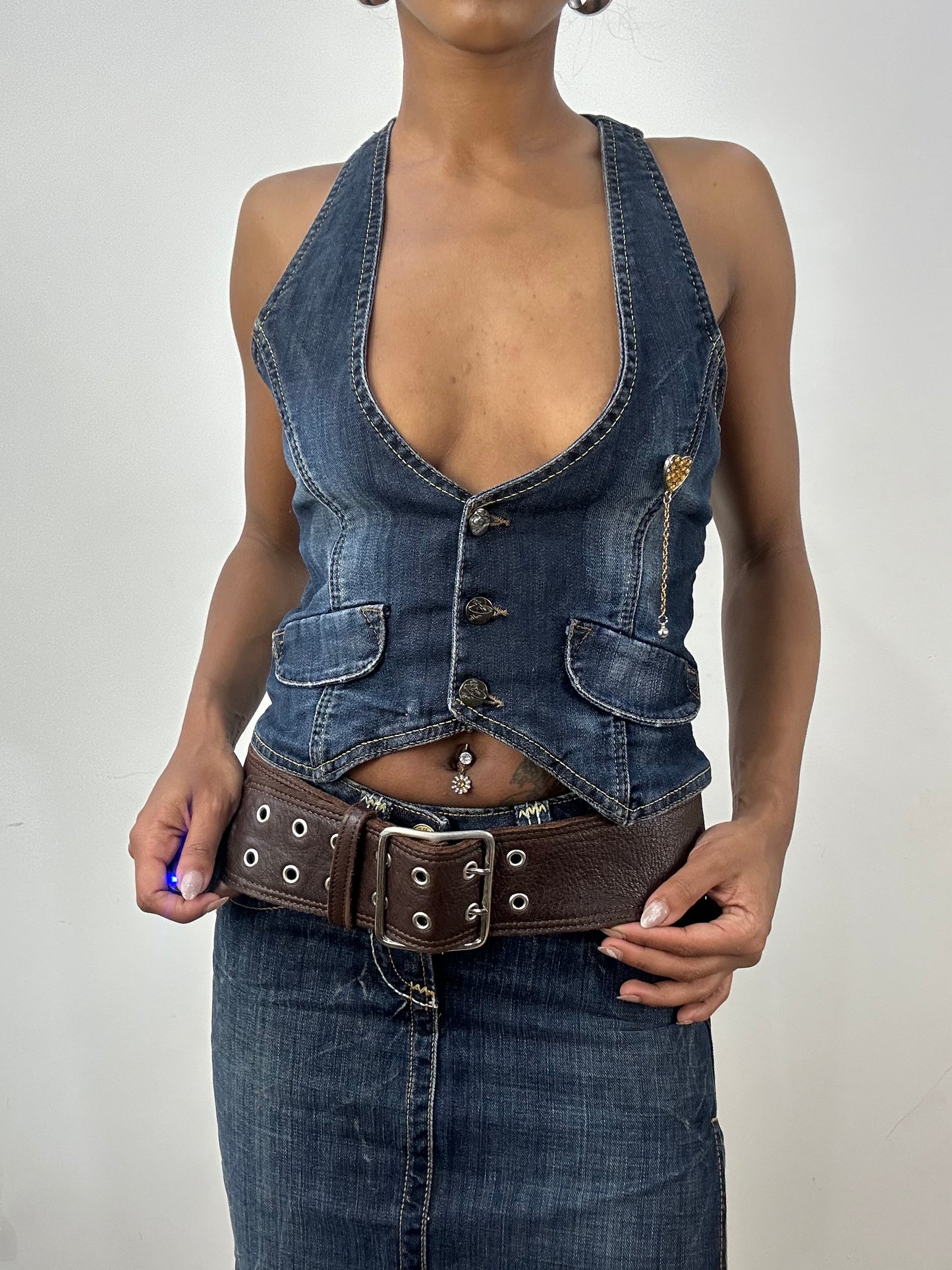 BEST PICKS | brown faux leather belt with silver eyelet detail