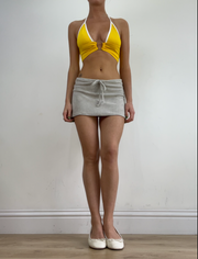 💻‼️ small yellow halter neck top with silver o ring detail