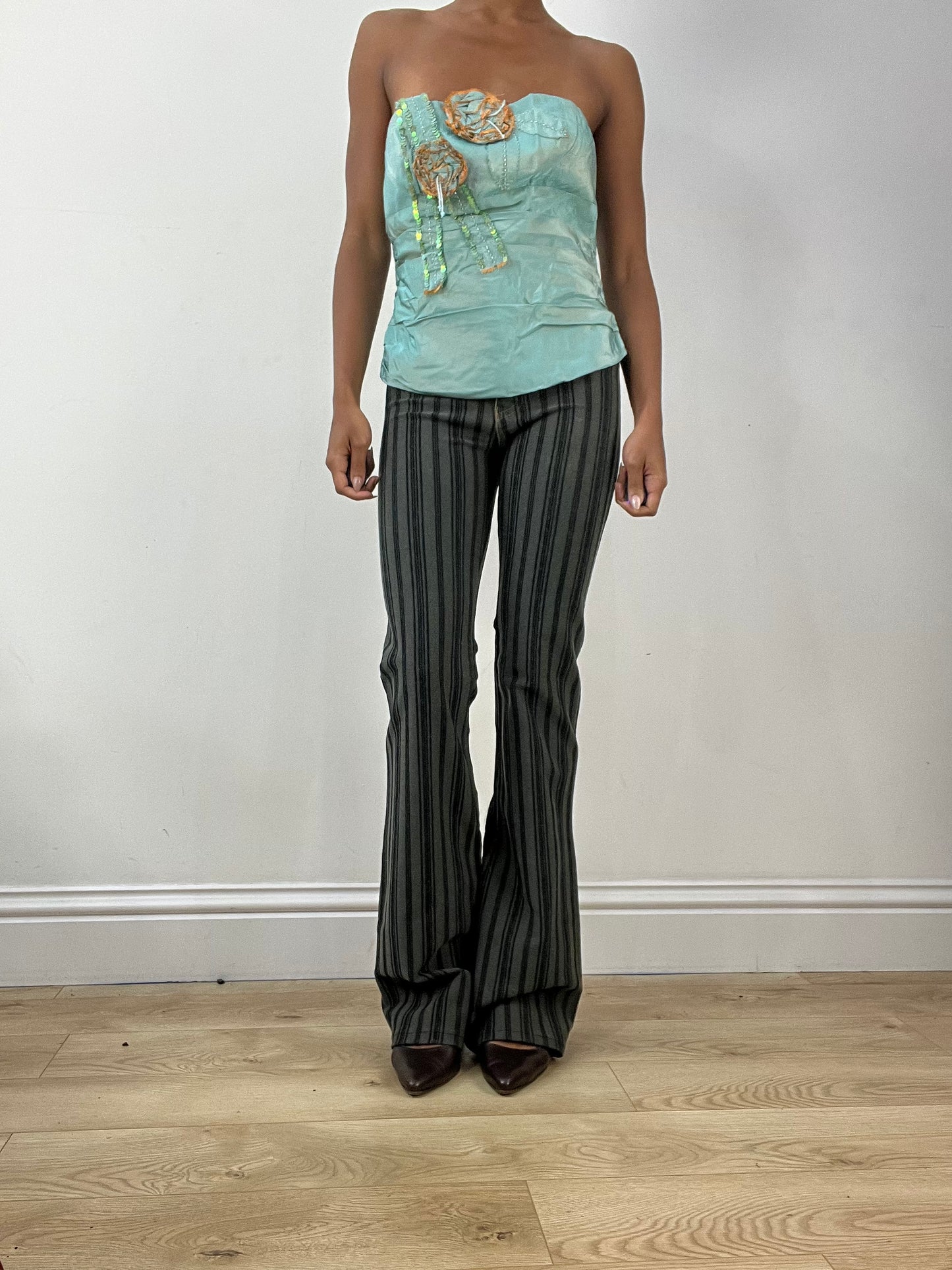 BEST PICKS | small blue iridescent corset top with 3d flower detail
