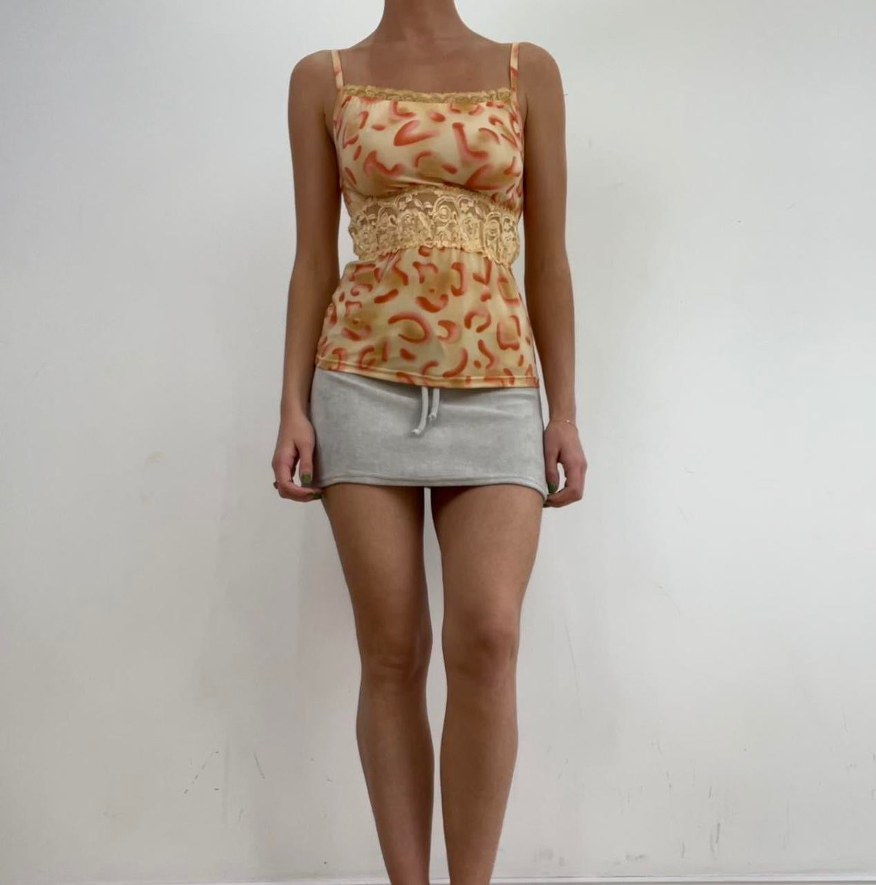 💻‼️small orange cheetah animal print vest with lace detail
