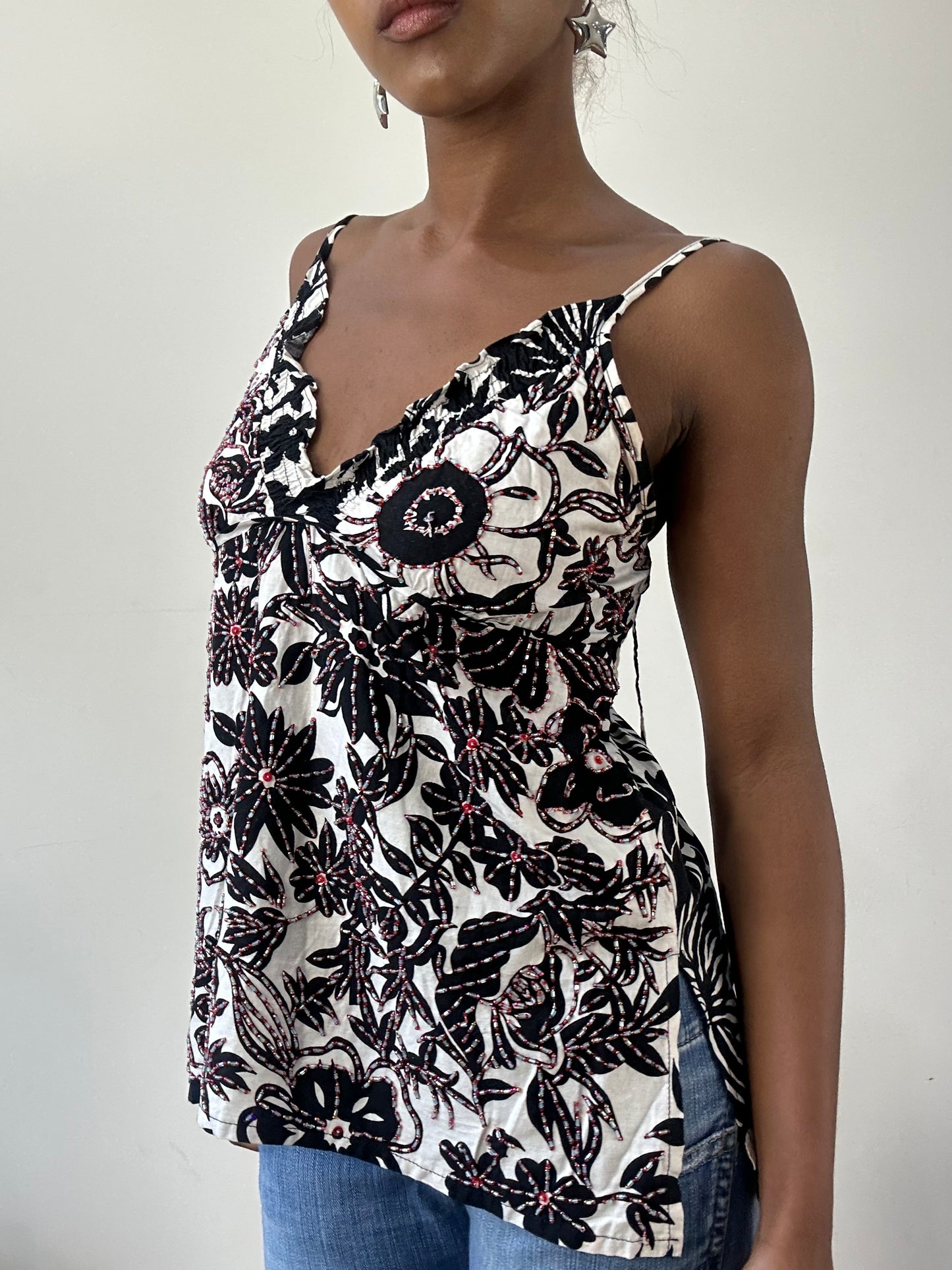 BEST PICKS | small white and black cami top with floral print