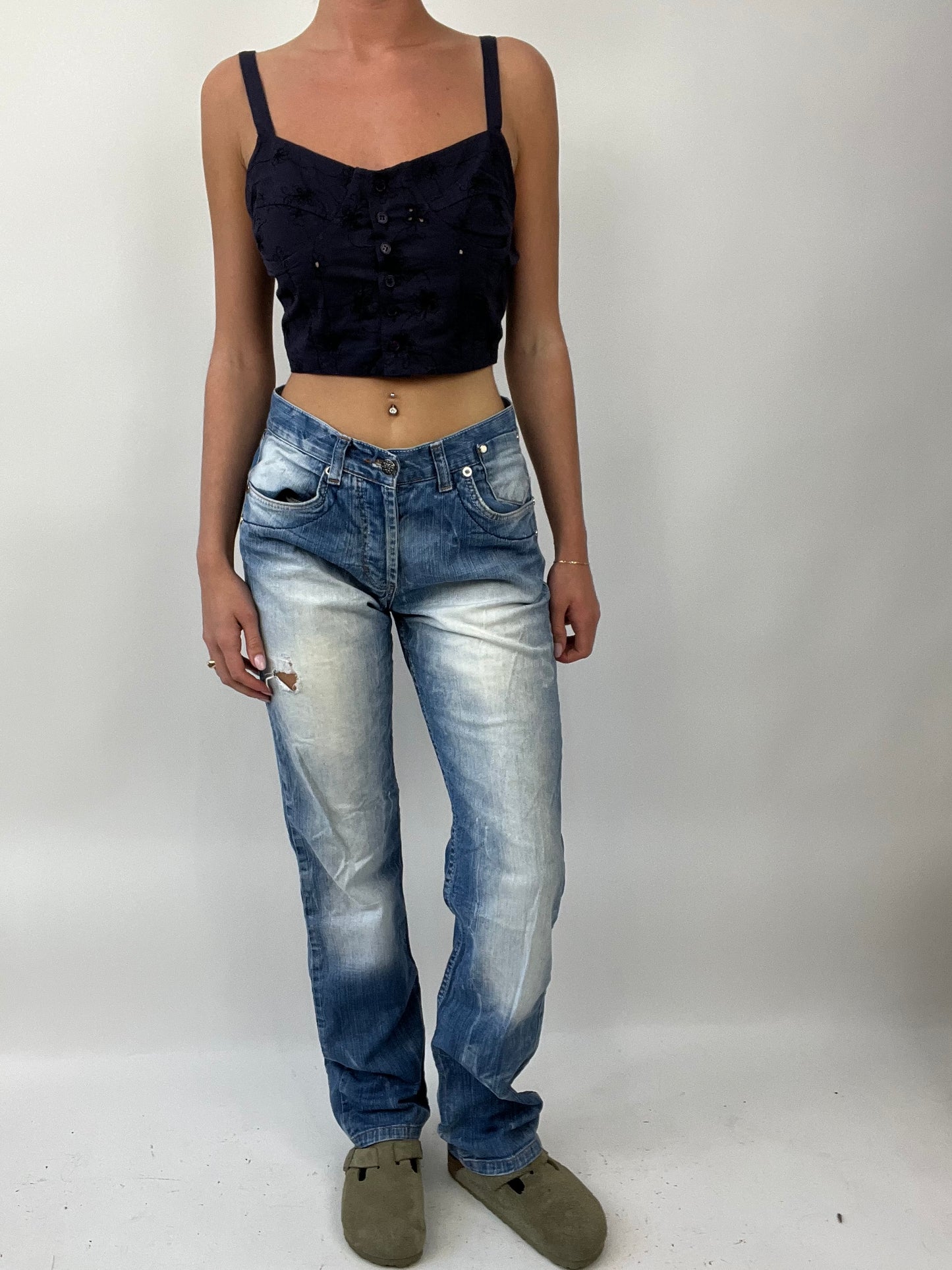 COASTAL COWGIRL DROP | medium light wash denim jeans with distressed detail