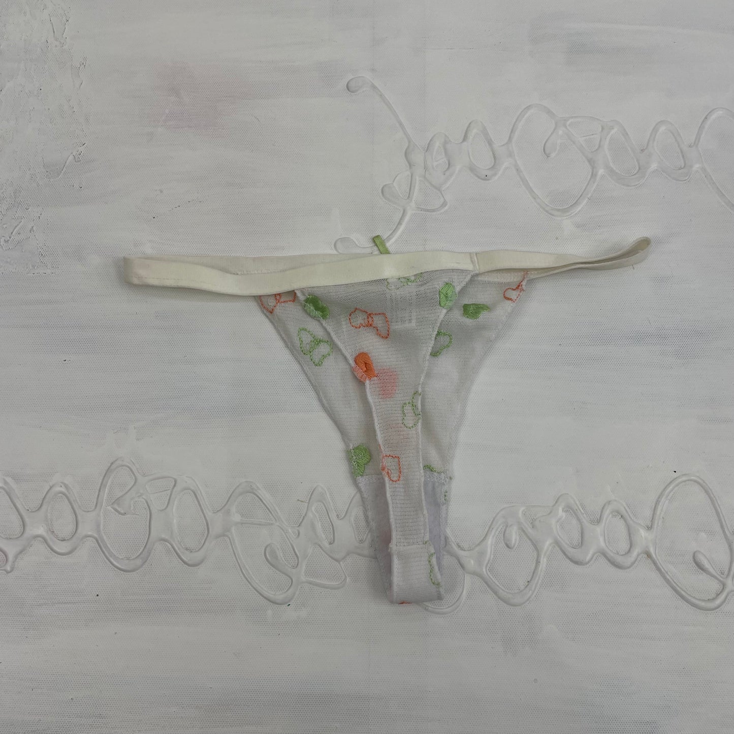 CHALET GIRL DROP | small white heart print mesh thong