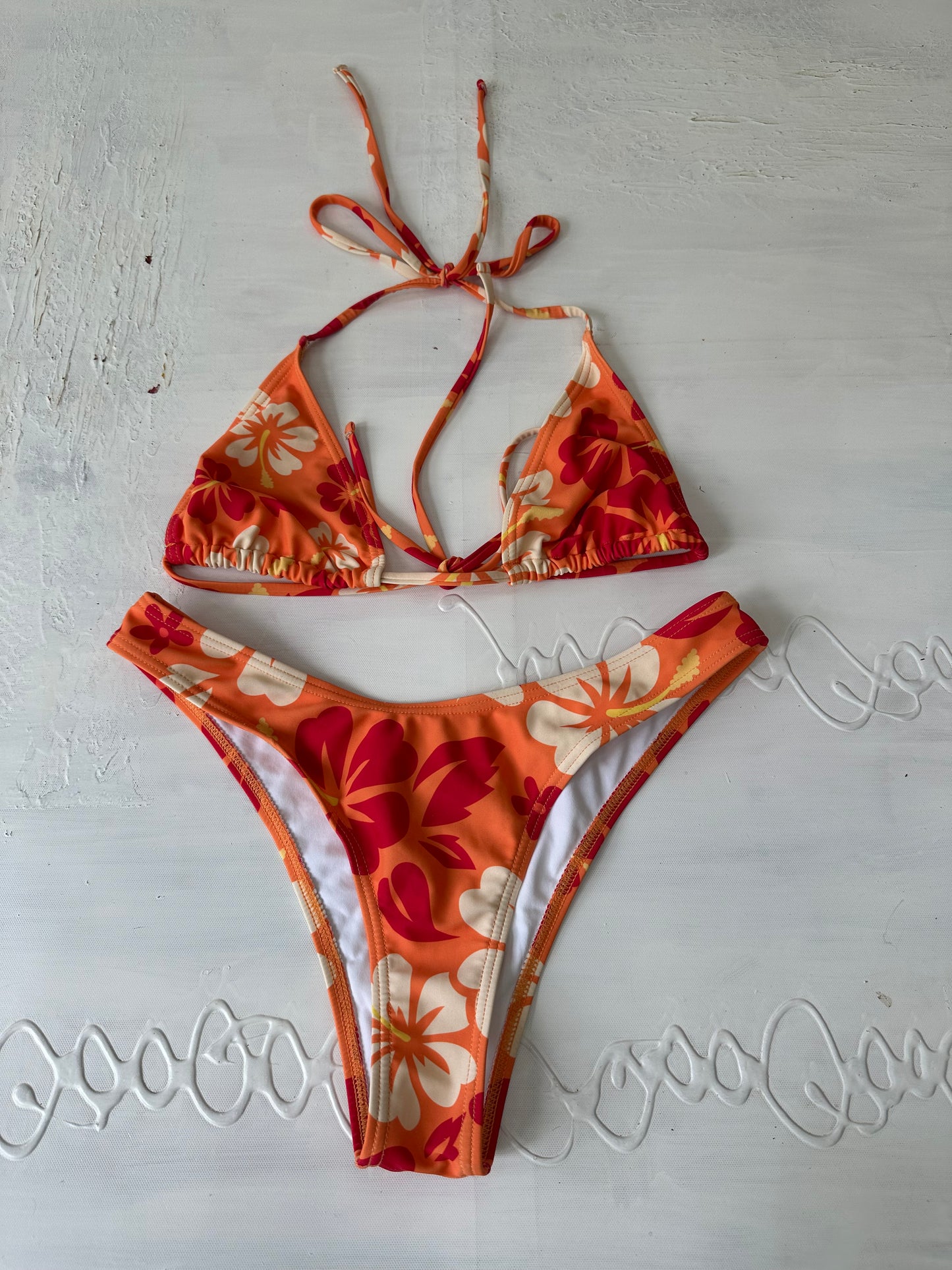 vintage edit twenty-seven | small orange hibiscus print bikini set with matching beach skirt