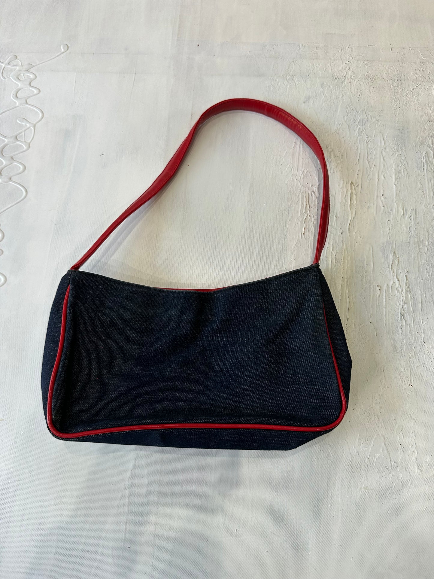 BEST PICKS | blue denim mini shoulder bag with red piping
