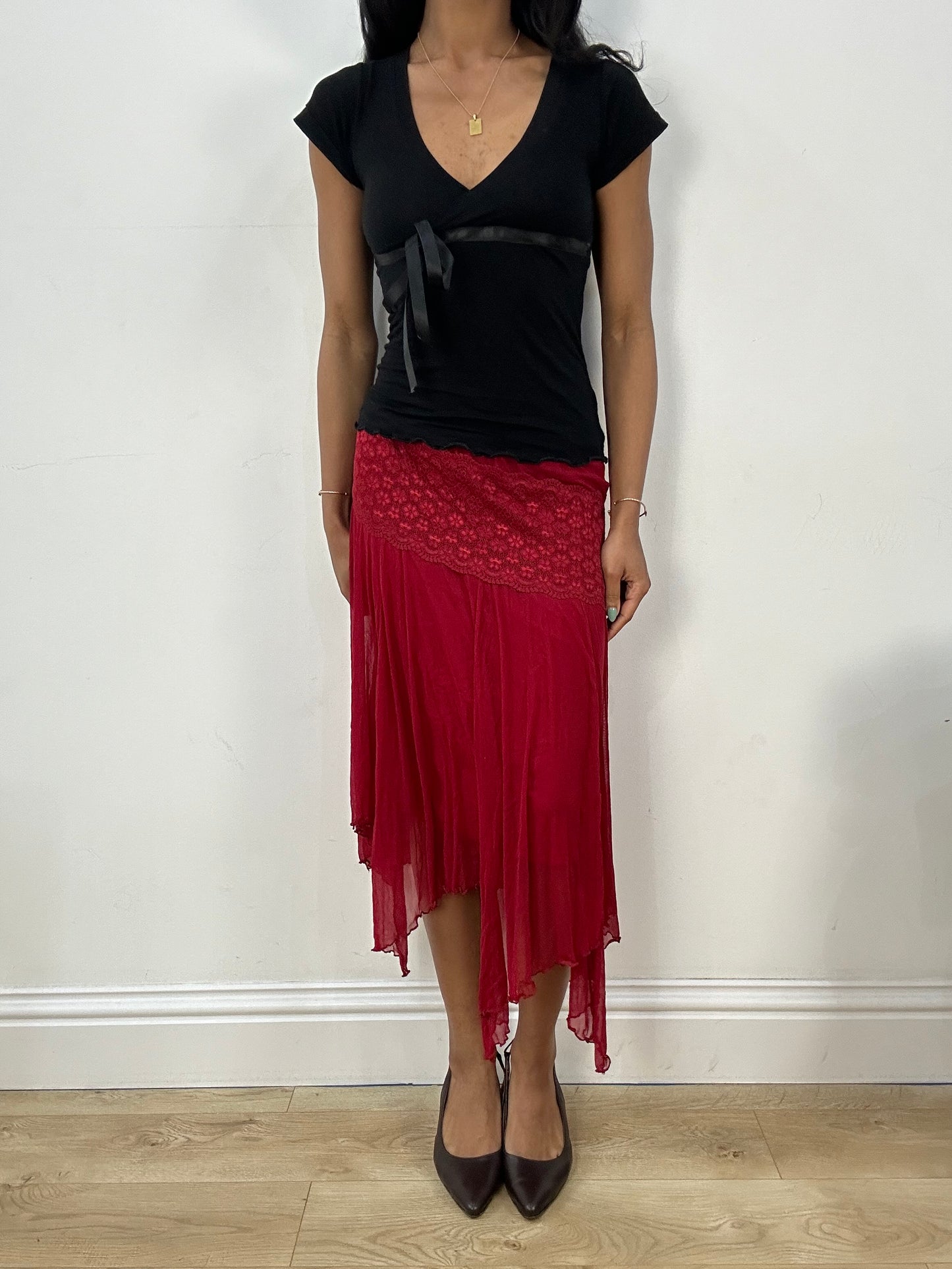 BEST PICKS | small red asymmetrical flowy skirt with floral embroidery