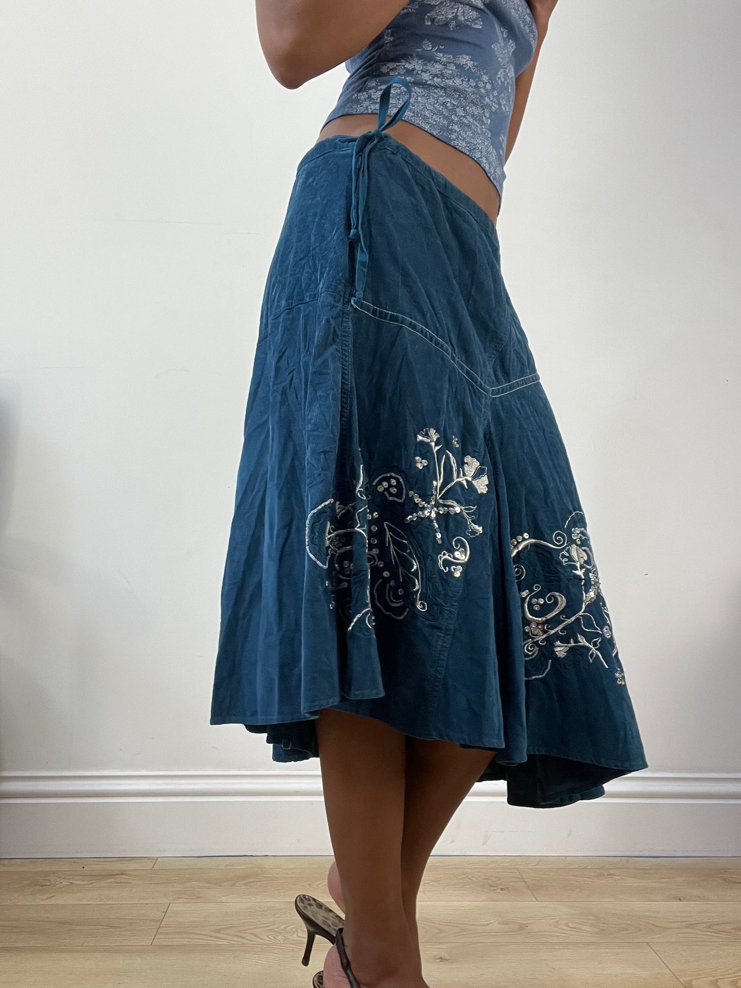 AUTUMN EDIT | medium blue asymmetric midi skirt with floral embroidery