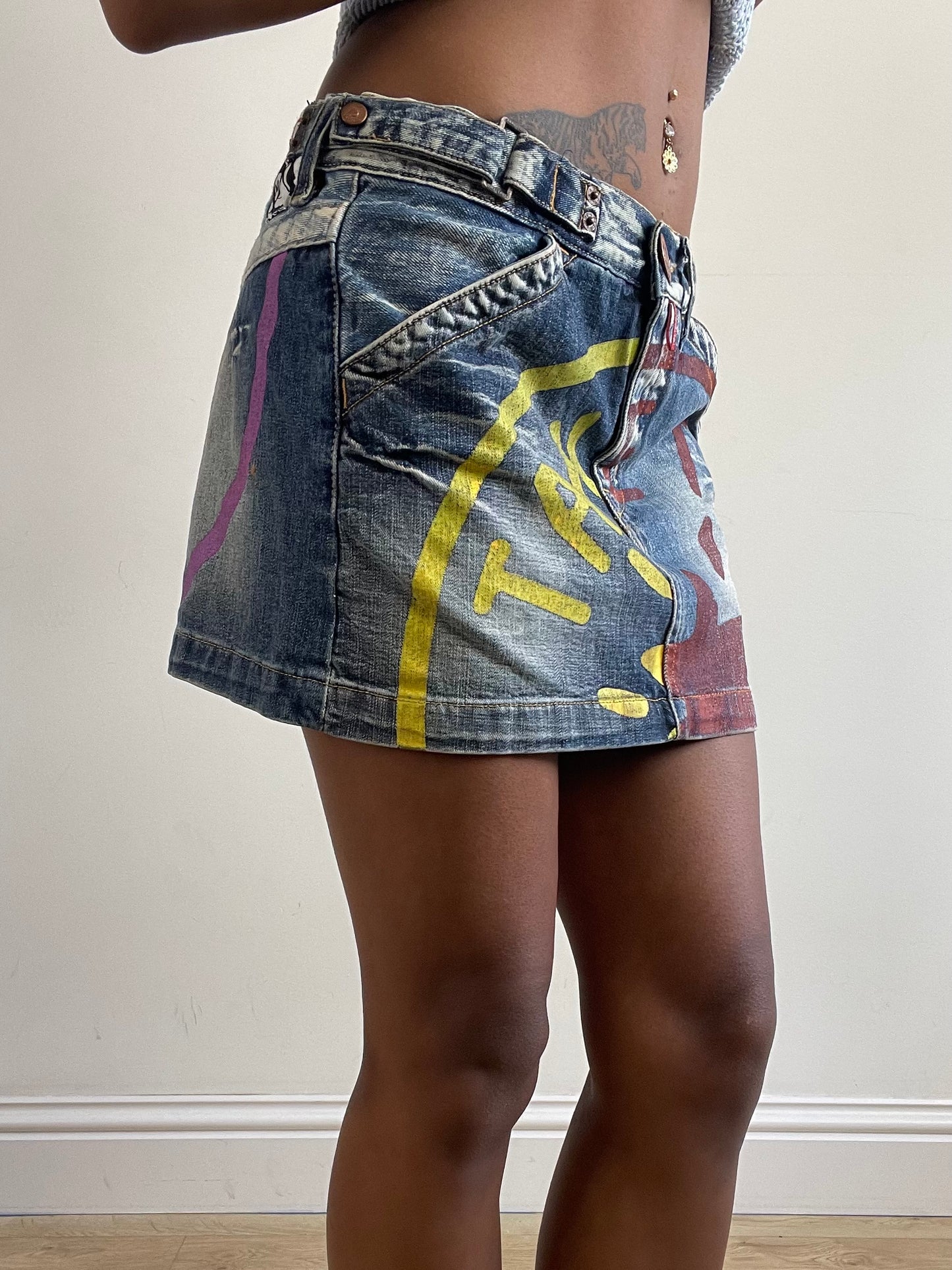 vintage edit twenty-seven | small blue take two denim mini skirt with logo and star graphic