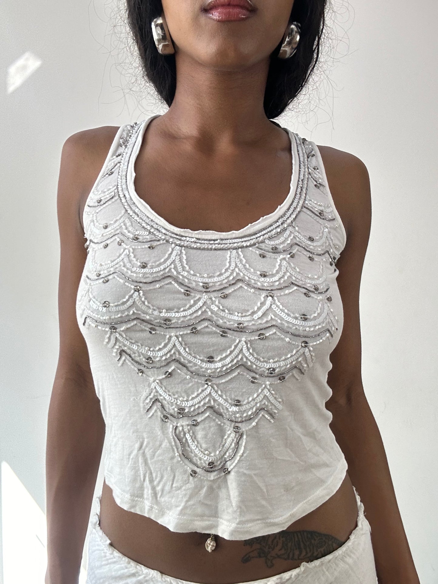 vintage edit twenty-five | small white jean's paul gaultier tank top with beading detail