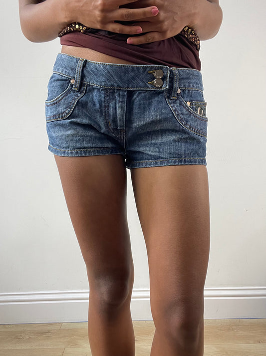 vintage edit: festival | small low waisted blue denim mini shorts with green embroidery