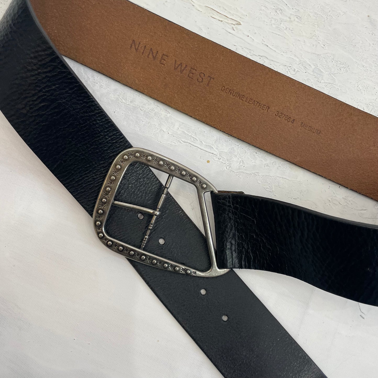 BEST PICKS | black leather belt with silver buckle