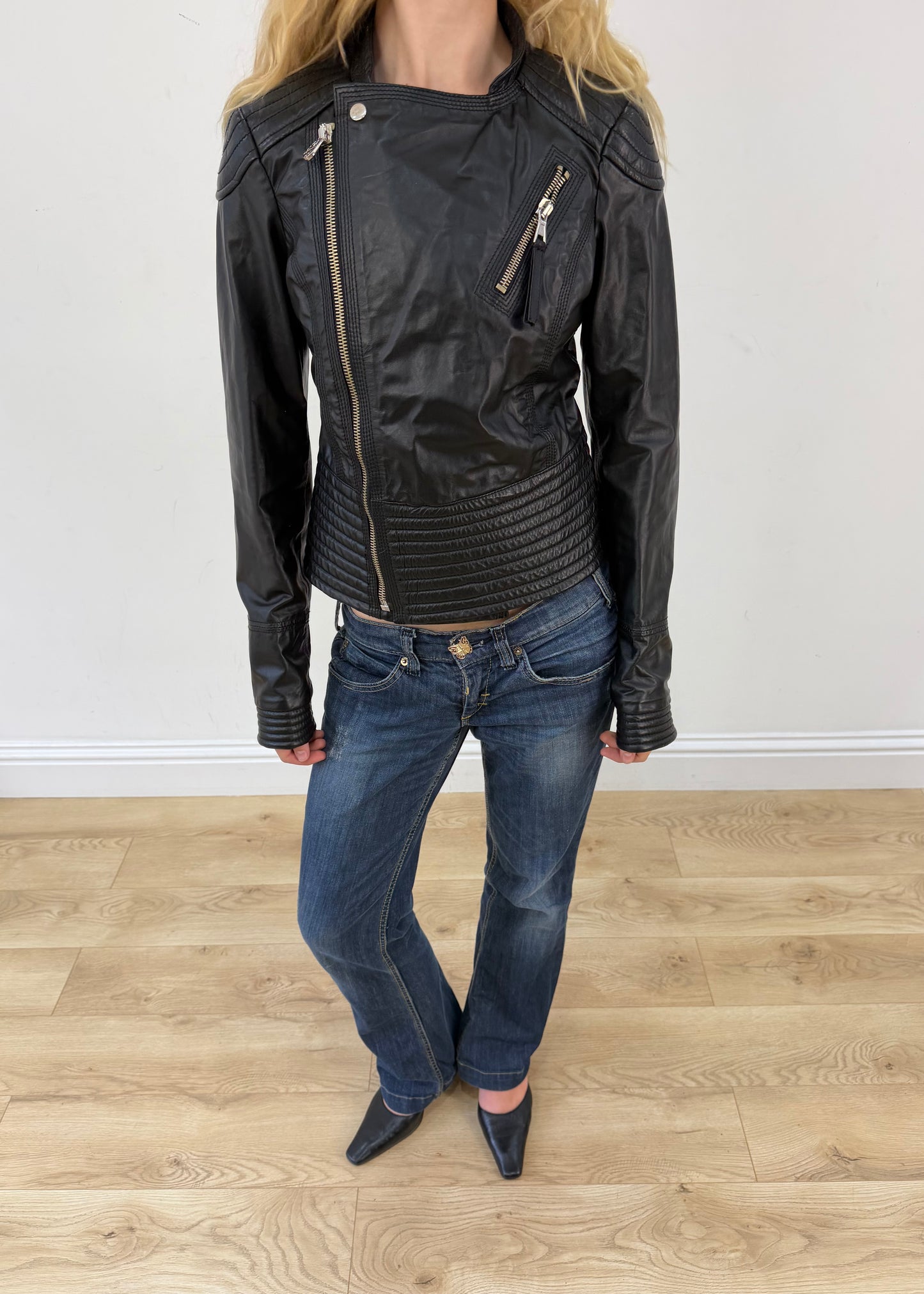 small black zip up leather jacket