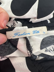 euro trash | small black and white halter neck spotted dress