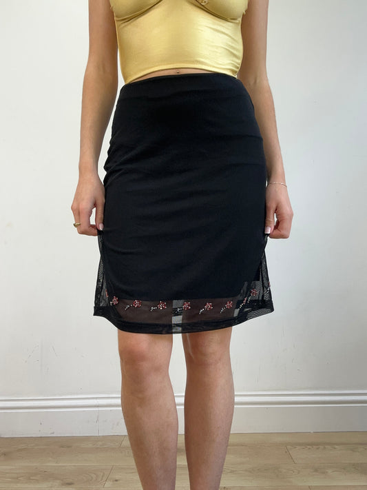 vintage edit twenty | small black old label hennes mesh skirt