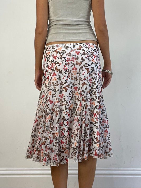 VINTAGE PICKS | medium white floral patterned midi skirt