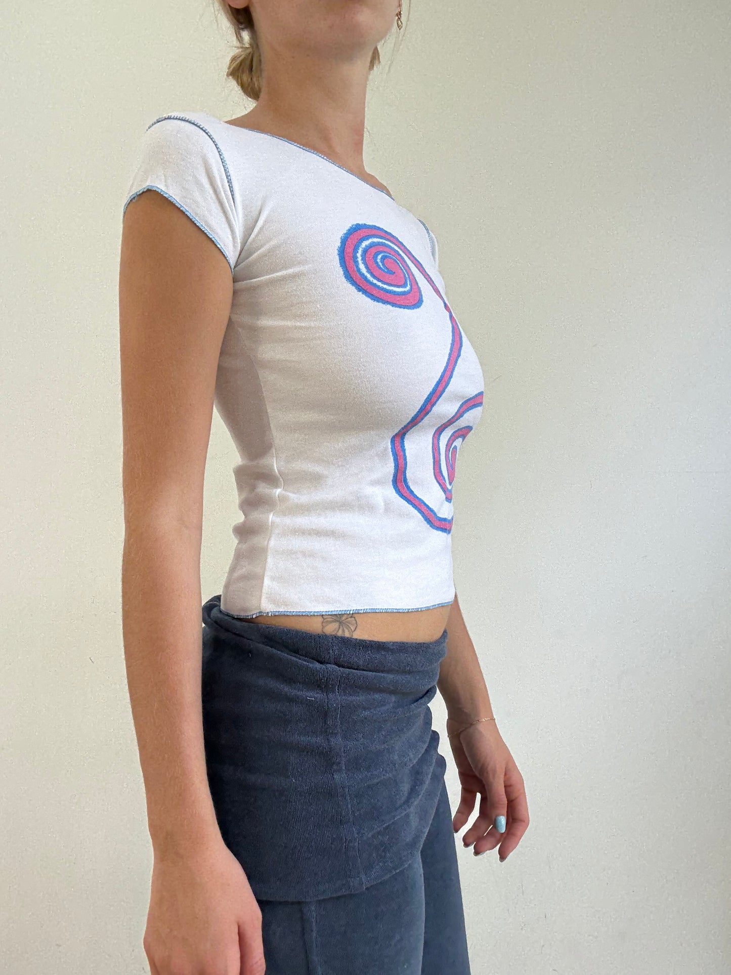 💻‼️ baby tee with sparkly blue and pink swirl design