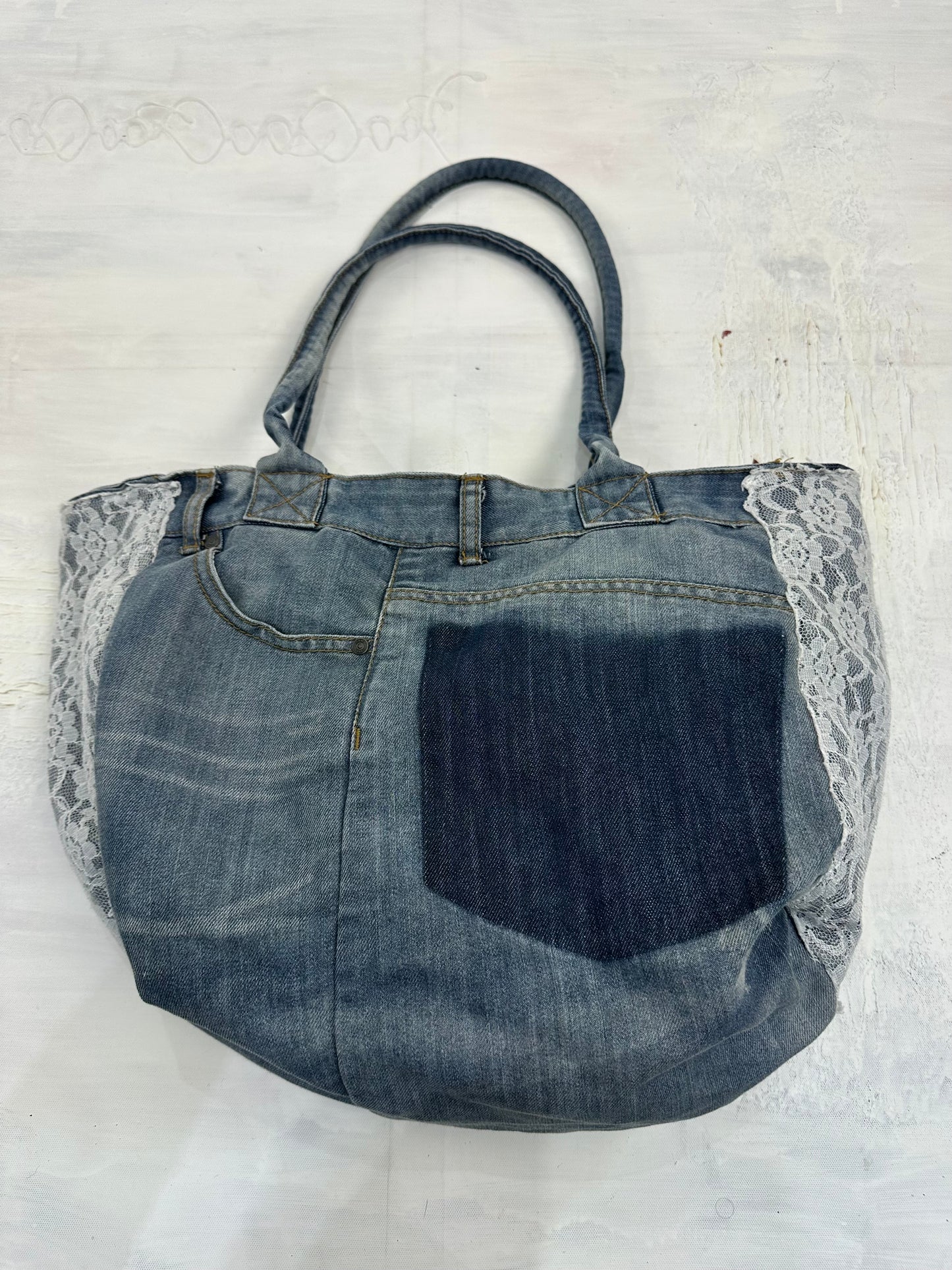 vintage edit: indie sleaze | blue denim tote bag with lace details
