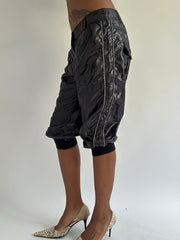 euro trash | small black leather style cropped cargo trousers