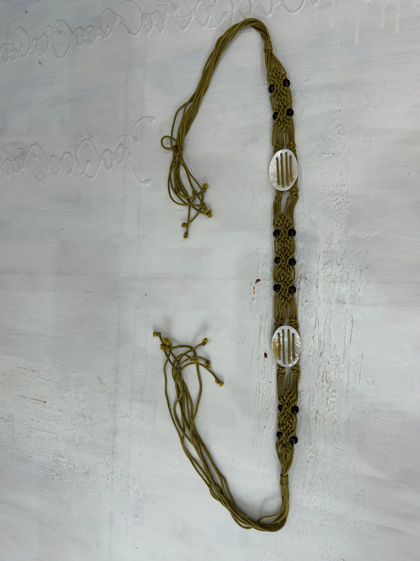 vintage edit: halloween | green and brown braided tie up belt with shell detail