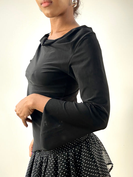 LFW edit | small black long sleeve top with metal pendant detail