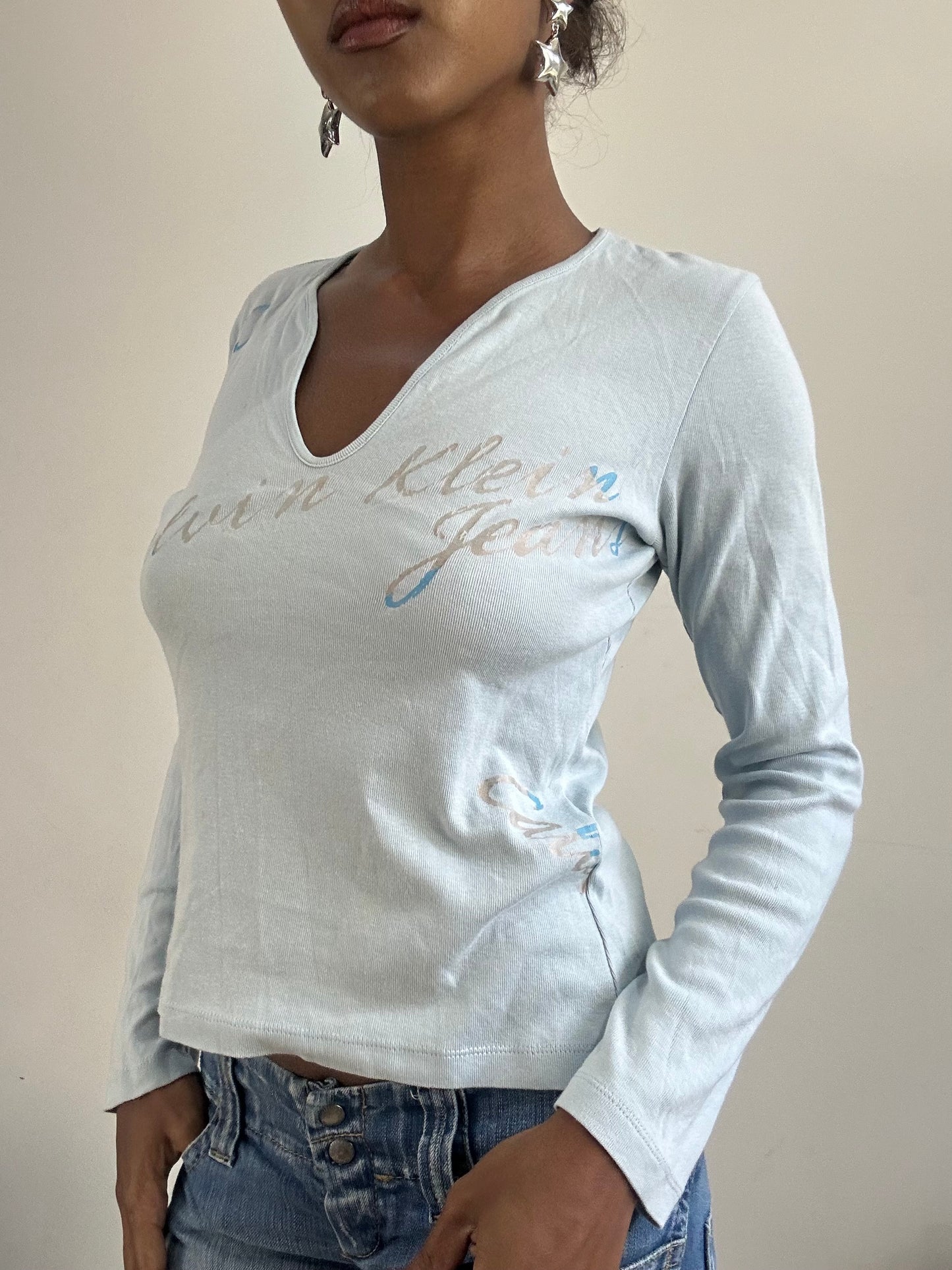 BEST PICKS | small light blue calvin klein long sleeve top