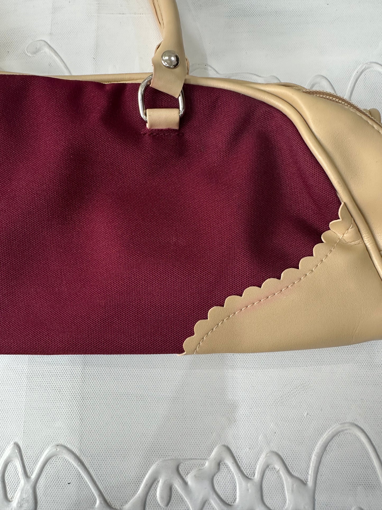 vintage edit thirty-two | burgundy and cream handbag with scalloped detail