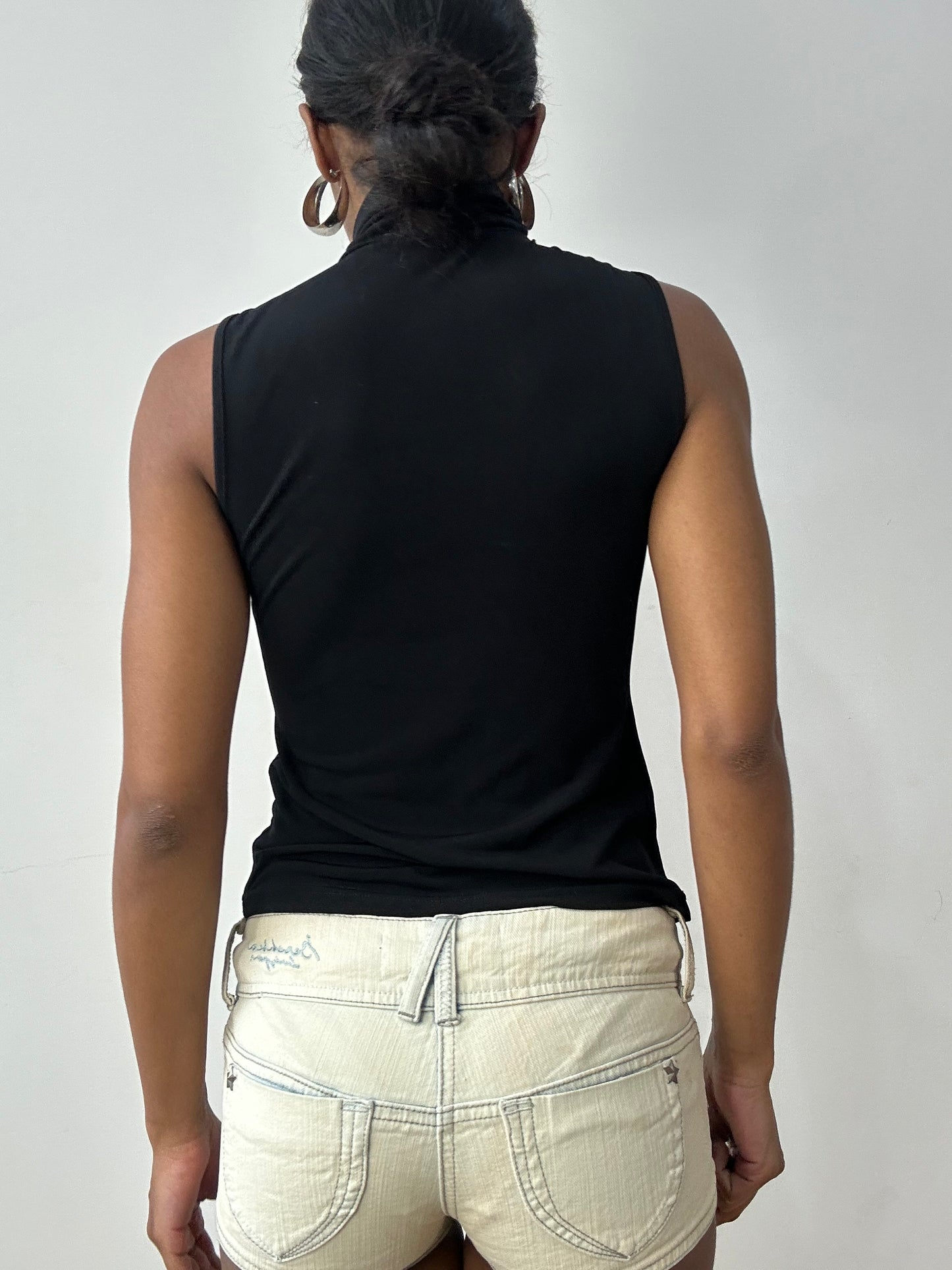 midsummer edit | small black sleeveless turtleneck with oversized sequin detail