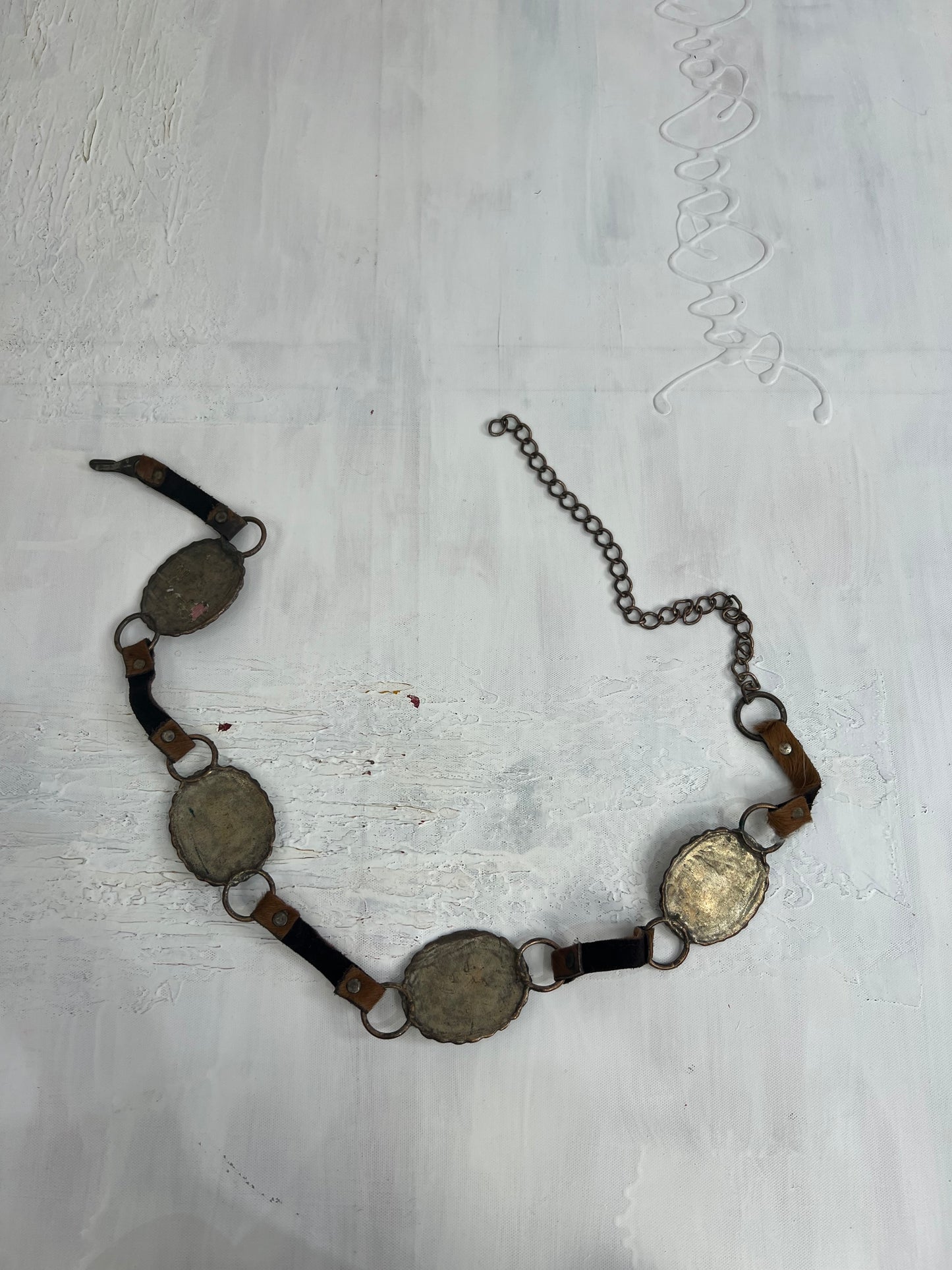 vintage edit twenty eight | brown faux fur belt with disc and chain detail