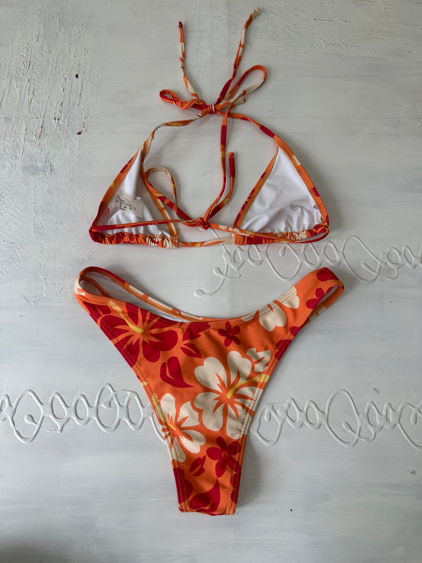 vintage edit twenty-seven | small orange hibiscus print bikini set with matching beach skirt
