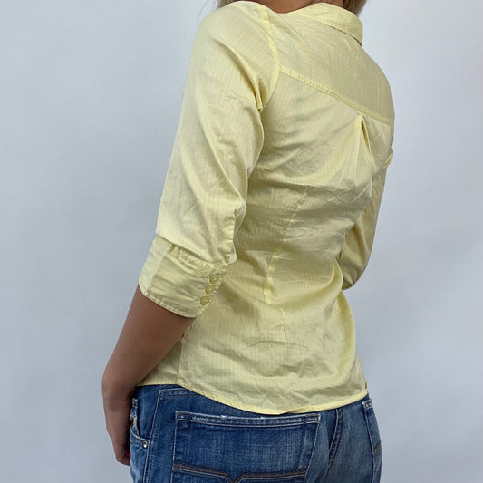 COASTAL GRANDMA DROP | small yellow old label h&m shirt