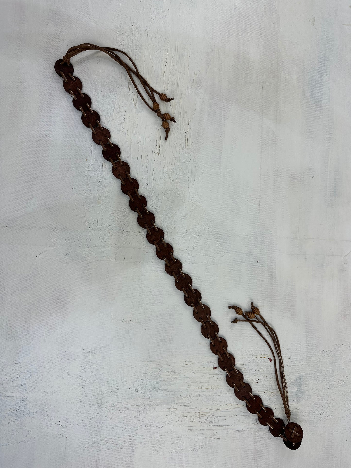 vintage edit: indie sleaze | brown belt with woven circle detail