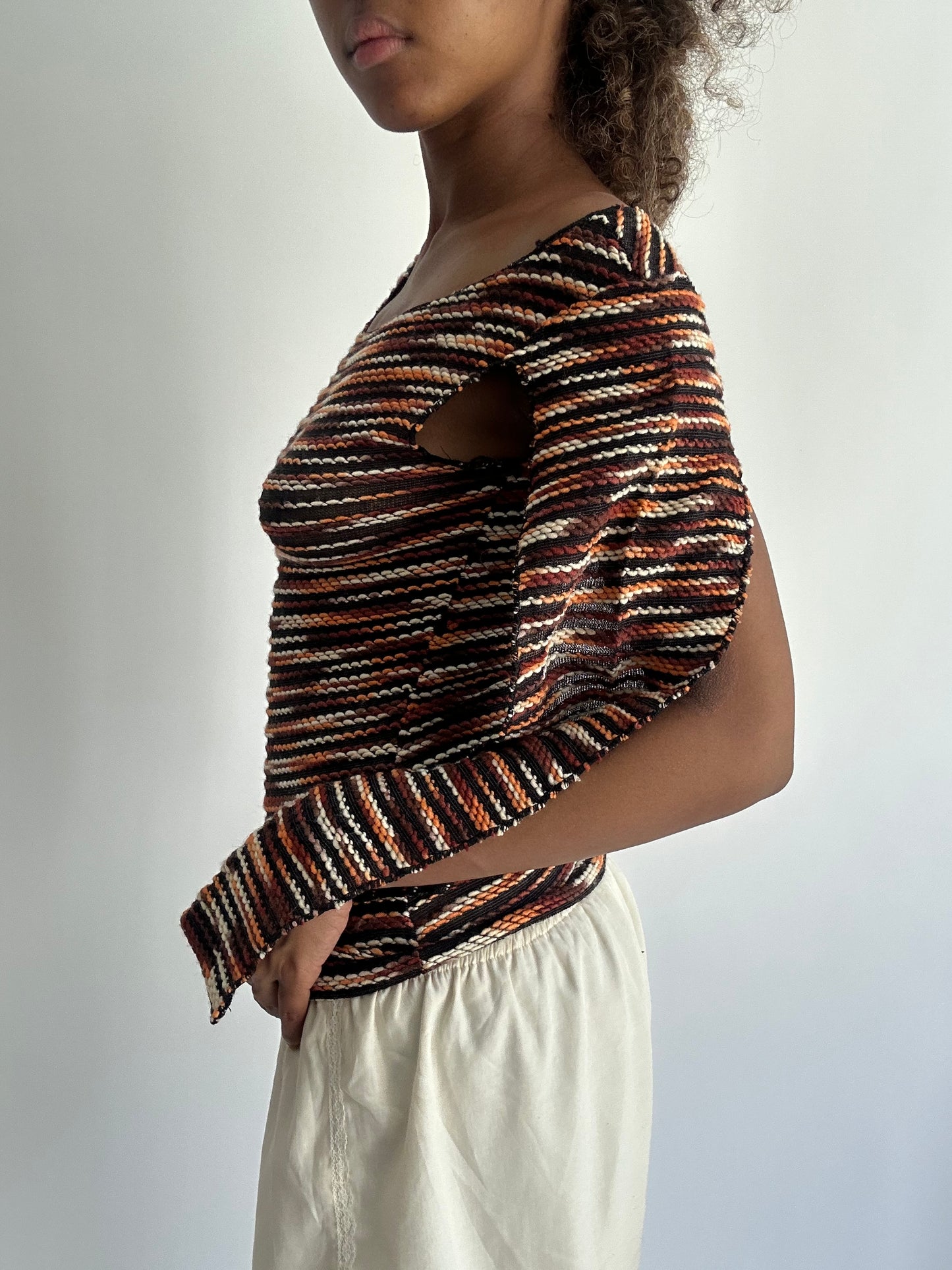 autumn picks | orange and black top with open long sleeves
