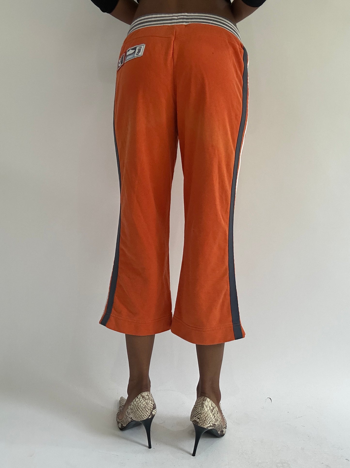 euro trash | small orange nike striped waist capri trousers