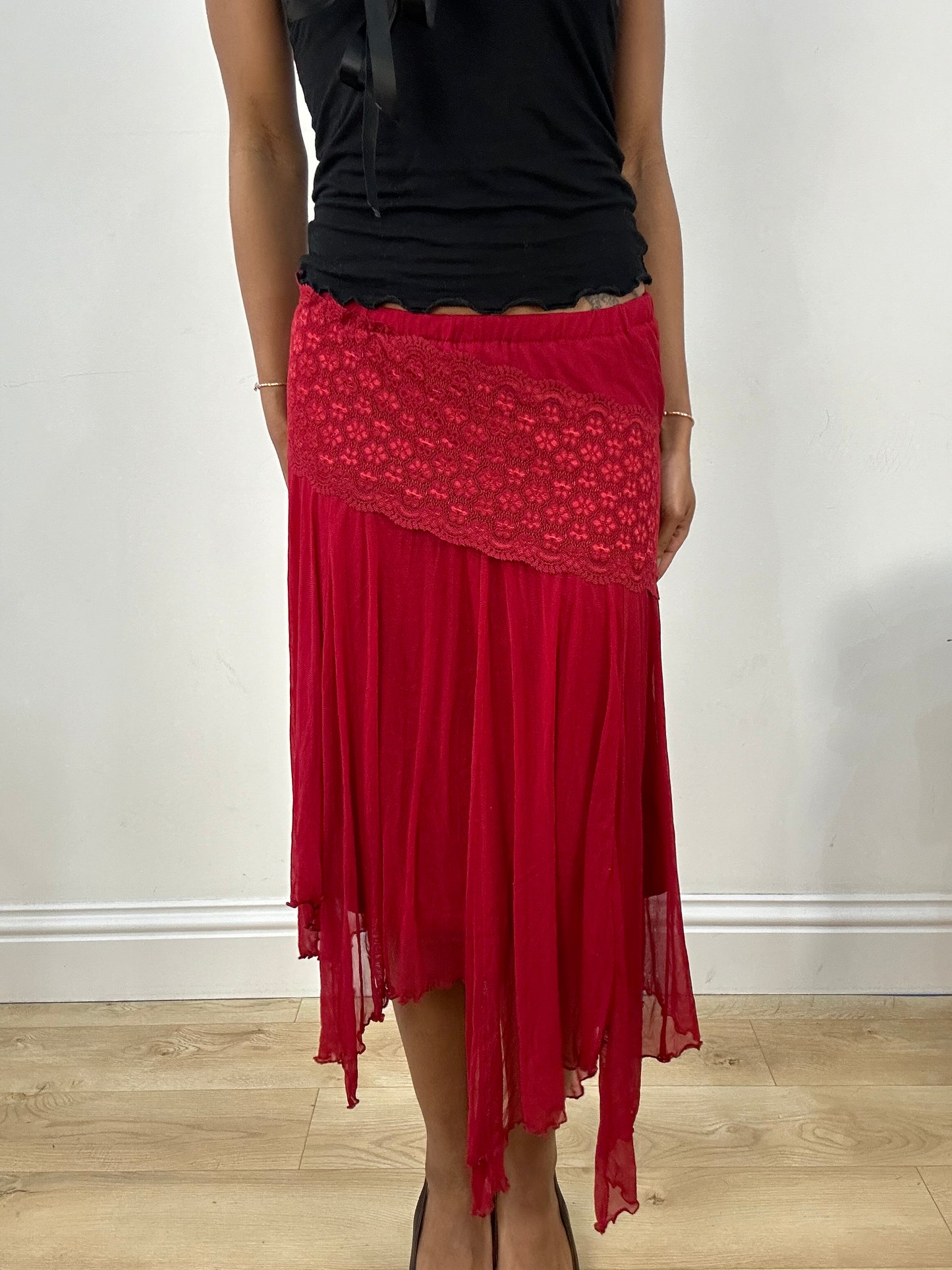 BEST PICKS | small red asymmetrical flowy skirt with floral embroidery