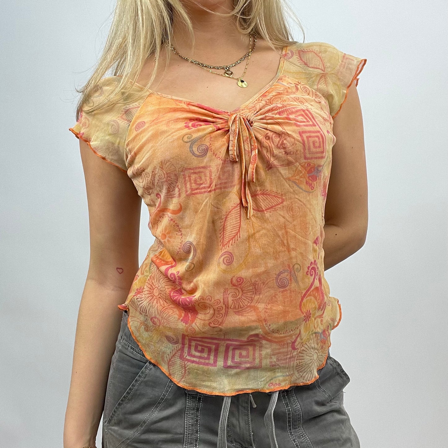 BEST PICKS | small orange mesh patterned t-shirt