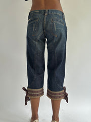 euro trash | medium blue denim capris with tie cuffs