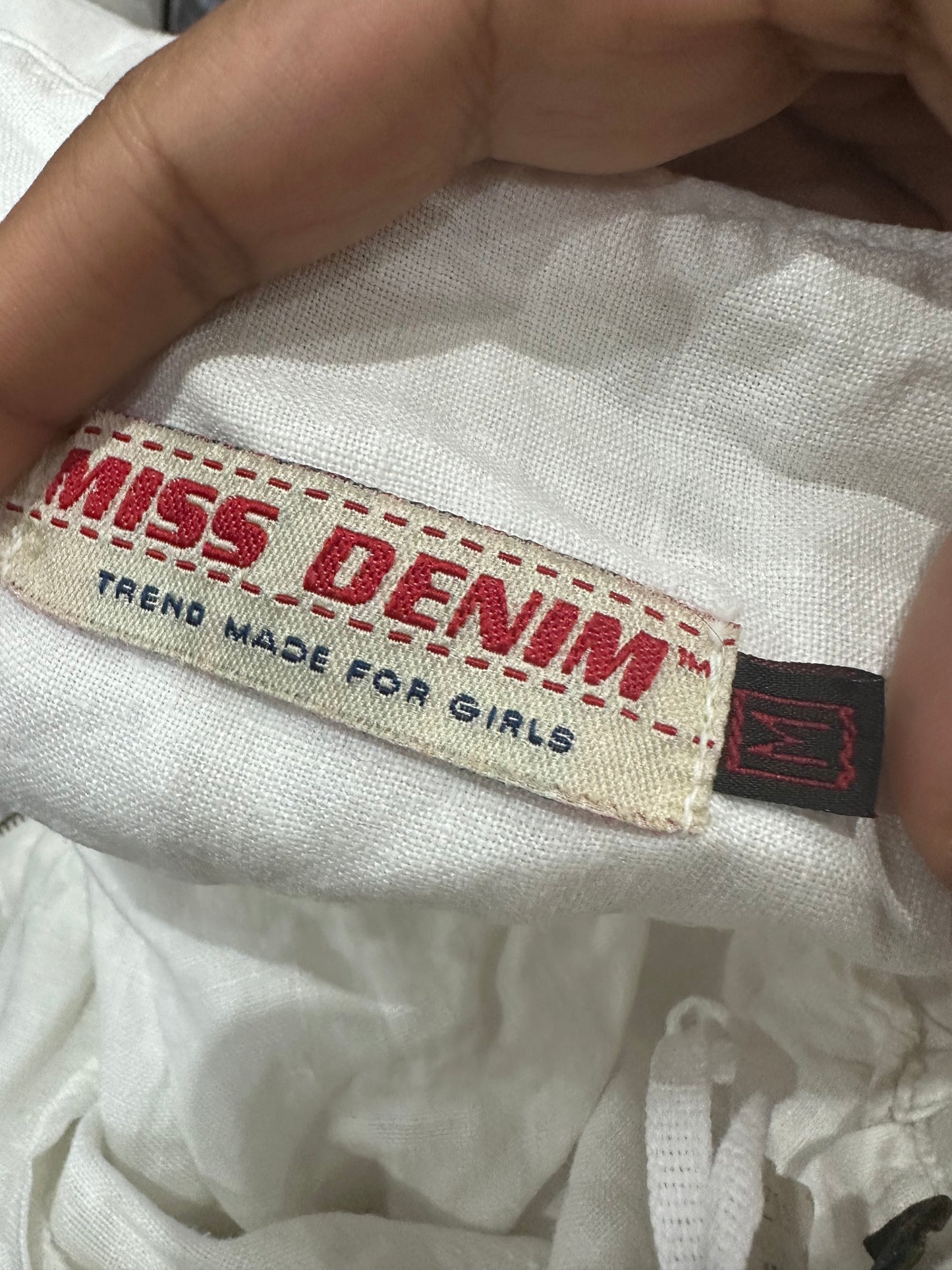 vintage edit thirty-four | medium white mini skirt with tie waist detail