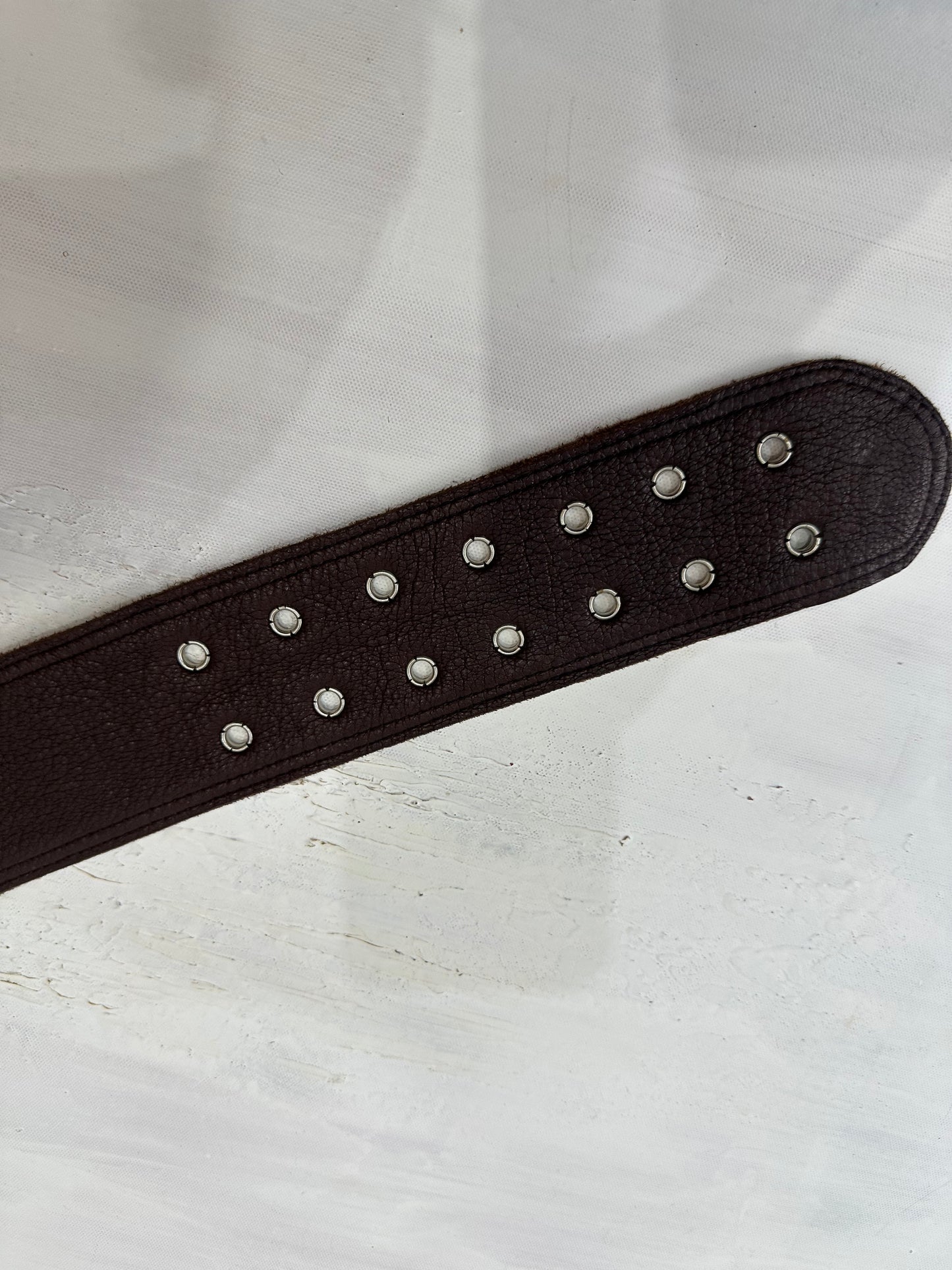 BEST PICKS | brown faux leather belt with silver eyelet detail