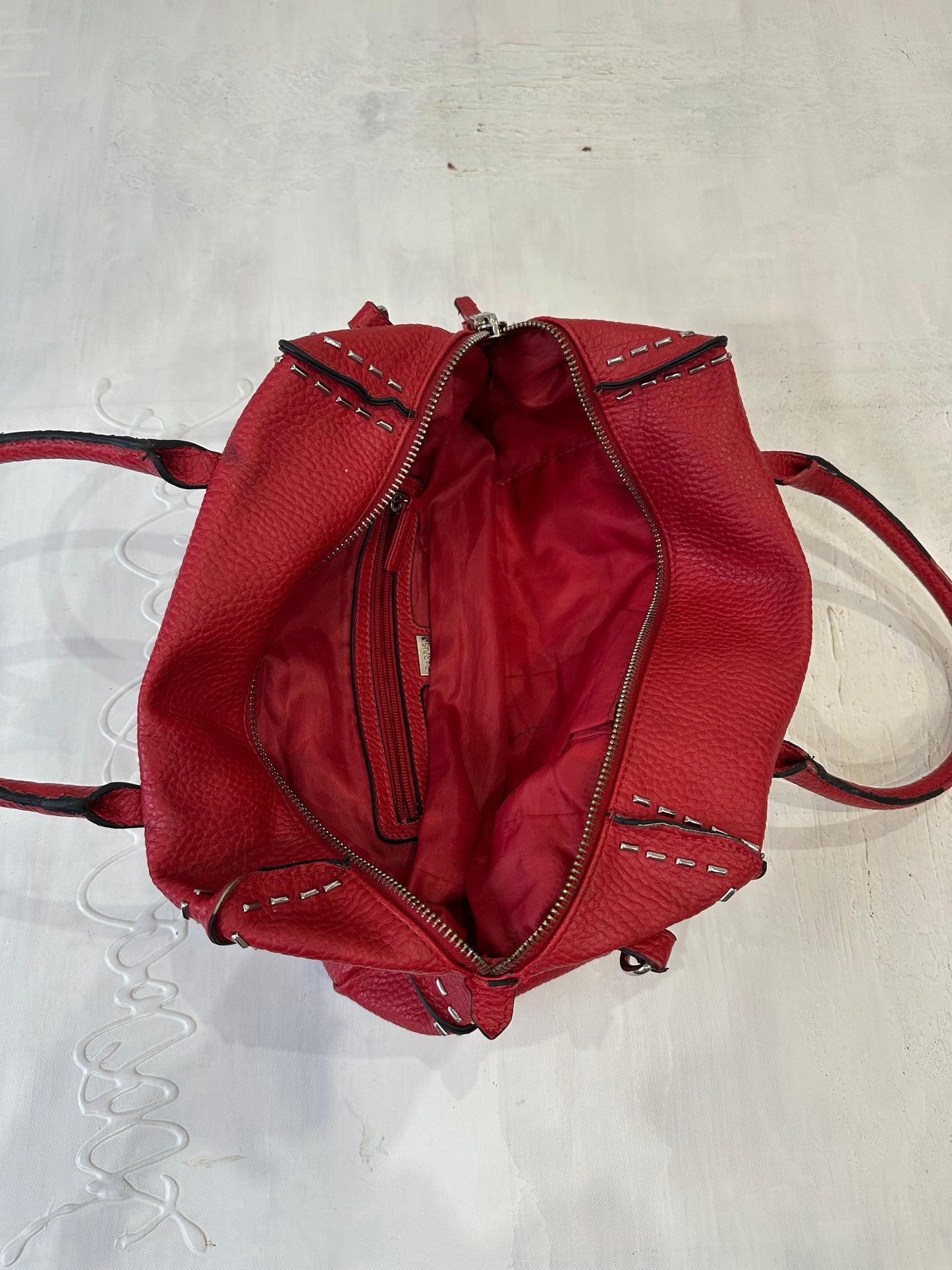 BEST PICKS | red faux leather shoulder bag with silver hardware details