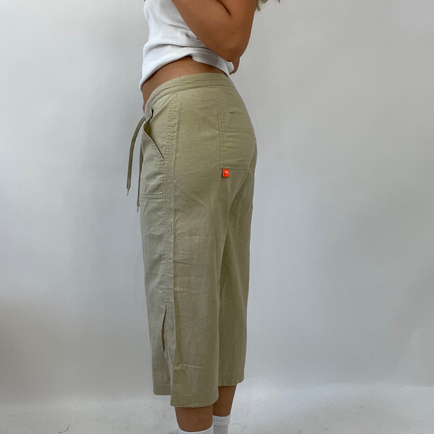 HAILEY BIEBER DROP | medium beige nike linen cropped trousers